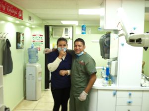 dentist and assistant in dental office