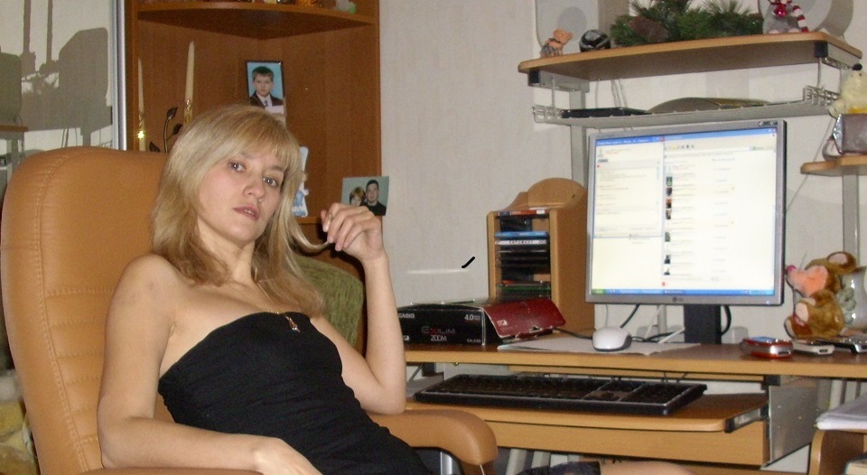blonde woman on a computer