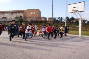 kids running in school physical education