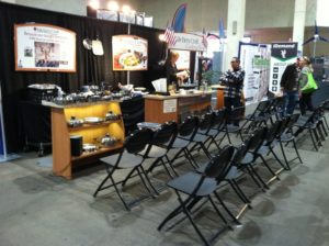 trade show booth with chairs for demonstration