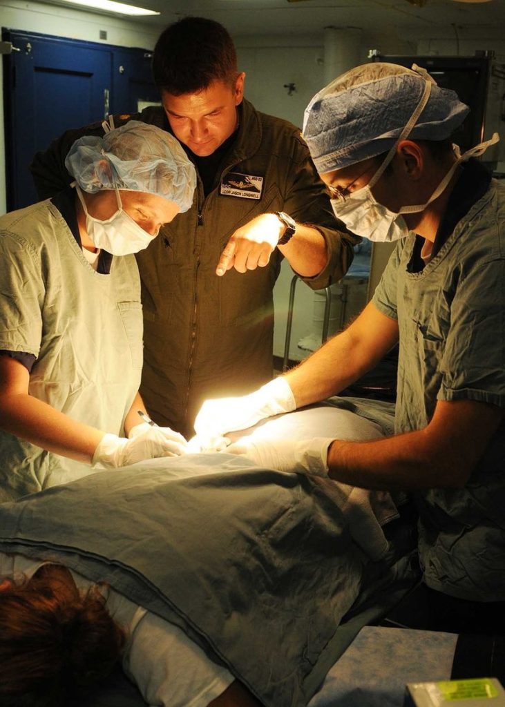 medical professionals doing surgery