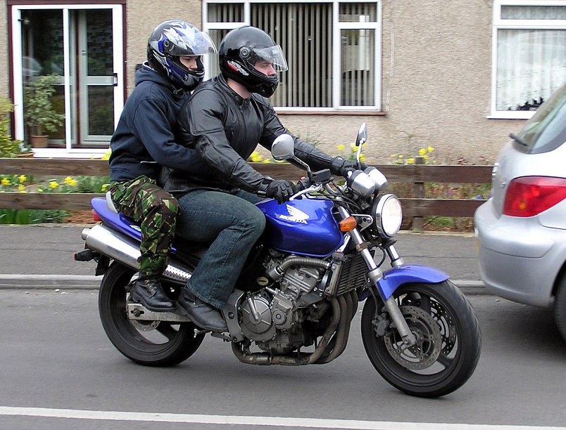 motorcycle riding with passenger