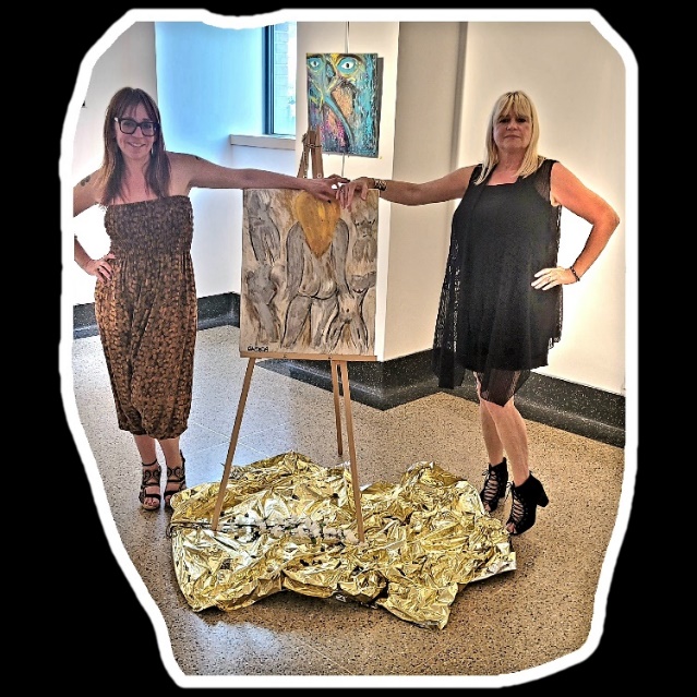 A.P. Giaconda and Anna Panunto unveiling a painting